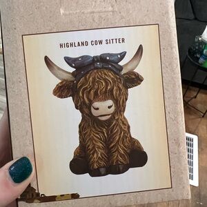 Limited edition Highland cow sitter from cracker barrel